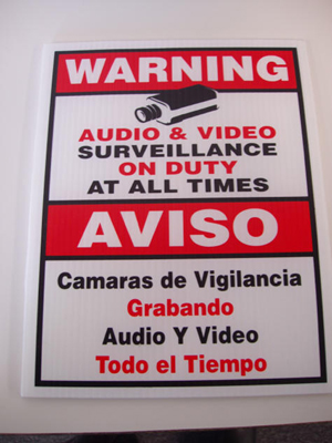 Warning Cameras on Duty Sign